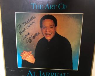 AL Jarreau poster signed to Isabella, stained at bottom