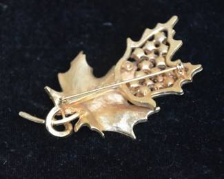 https://www.auctionninja.com/come-find-your-treasure/product/114-vintage-sara-coventry-1962-design-gold-tone-leaf-inlay-rhinestones-400080.html