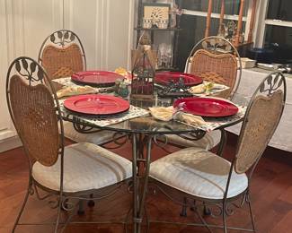 wrought iron and glass kitchen/dining table and 4 heavy chairs-  quality set here 