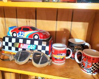 Nascar cookie jar, coffee mugs, & vintage racing goggles