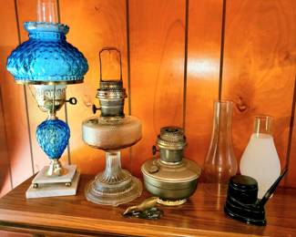 Vintage blue hurricane glass lamp, 2 Alladin lamps, lamp globes, ink well and fountain pen, & more