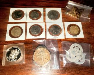 Coins & tokens including some silver. Walking Liberty Silver Dollar money clip