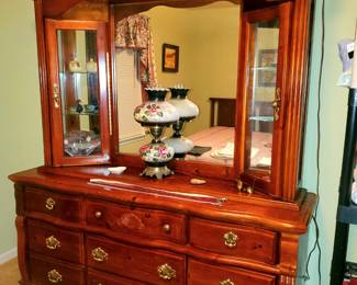 Dresser with lighted curios