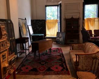 Different kilims and Oriental and Persian antique carpets and rugs