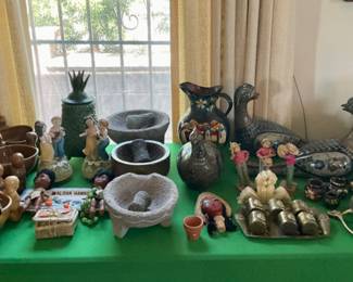 Hawaiian tiki bowls, music boxes. Mexican pottery pieces.