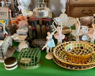 Ballerina figurines.  Flower frogs.  Tea cup sets.