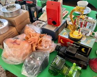 Doll faces, hands & feet.  Metal ashtrays.