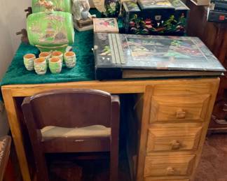 Small desk. Small chair. Asian scrapbook/music box. Asian jewelry box. Lladro Asian woman. Sake barrels w/cups. Cloisonné vase. Fu dog. Alabaster Opera dishes.