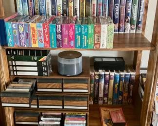 VHS tapes.  Cassette tapes. Shelving unit