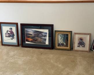 Variety of framed art and mirrors