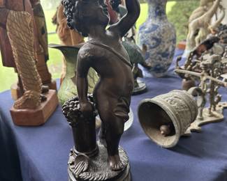 Bronze and hand-carved wooden sculptures