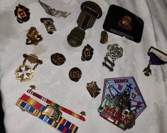 Military pins, badges and a patch