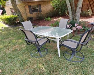 outside table and four chairs
