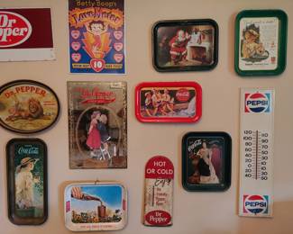 vintage porcelain thermometers and a variety of advertising trays