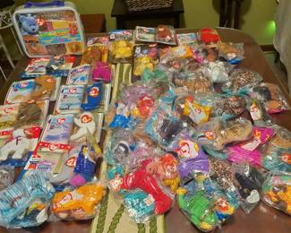 Beanie Babies still in original packaging.