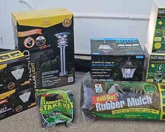 Collection Of Lawn Care Supplies And Solar Lights