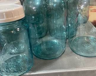 Assortment of Blue Glass Mason Jars