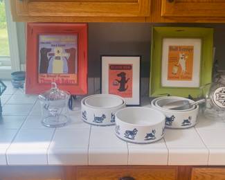 Framed dog pictures, dog bowls, dog food stand