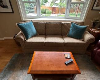 Lovely Fabric Couch (coffee table not for sale)