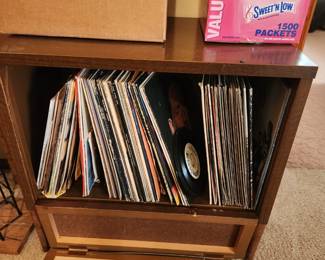 Records plus another box. 