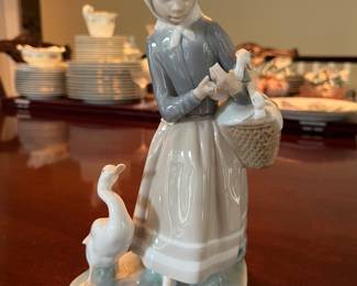Lladro girl with geese figurine (damage to fingers).