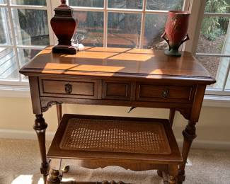 Antique sewing cabinet with bench.