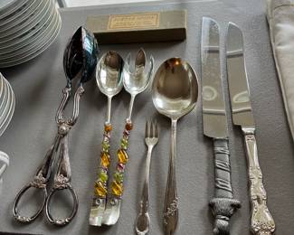 Selection of knives and serving utensils.