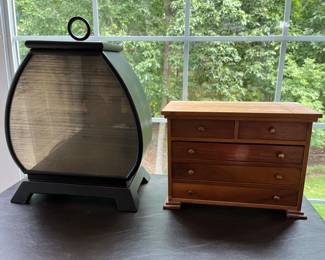 Vintage jewelry box (right); metal lidded container.