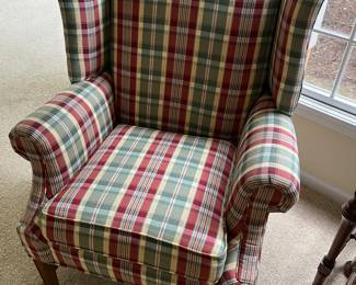 Closer look at one of the two matching Clayton Marcus easy chairs.