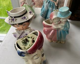 Vintage ceramic lady planters and lady head planters.