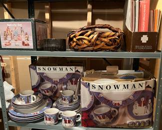 Two Christmas “Snowman” 20-piece stoneware sets (service for four).