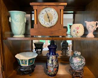 Mantle clock; Asia-inspired pottery; vintage vase (Weller or similar maker).