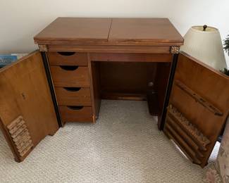 Closer look at the interior of the vintage sewing cabinet (shown in preceding photo).