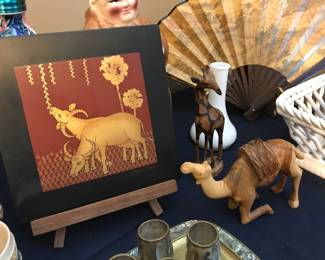 Beautiful Golden Cows - India.  Love the carved giraffe.