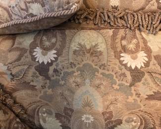 Beautiful NFM Sofa and Love Seat with comfy pillows.  This picture depicts the color of the fabric.