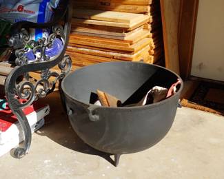 Large antique black iron pot. 