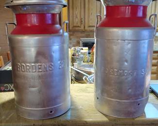 Borden and Foremost antique milk cans. 