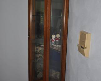 Another lighted curio cabinet