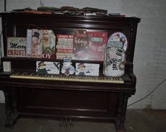 Piano and numerous signs
