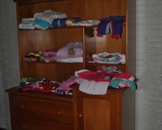 Cabinet and baby clothes