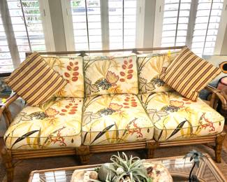 Tropical print rattan sofa