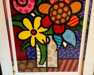Large
silk screen by Romero Britto This is one of his famous 3D silkscreen framed images. The frame is hand painted to blend with the print.