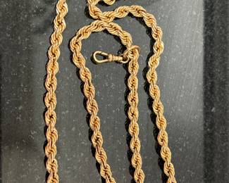 24 inch 14k gold roe chain 17 DWT 
In case you are not familiar with DWT there are 20 DWT to one once