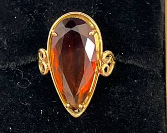 18k yellow gold ring with large pear cut Spessartine Garnet