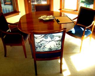 Cherry kitchen table with four upholstered chairs