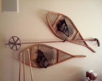 Antique snow shoes and ski pole