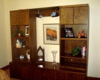 Items on shelf and Steeple clock