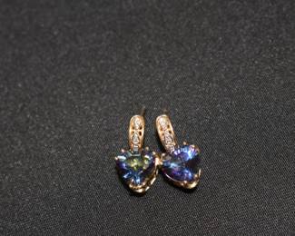 a different angle of the opal earrings