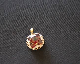 10k gold ruby and diamonds pendant