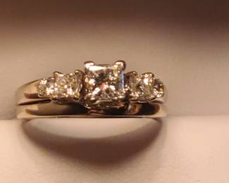 Gorgeous 14K White Gold wedding set with. 70ct center stone. 